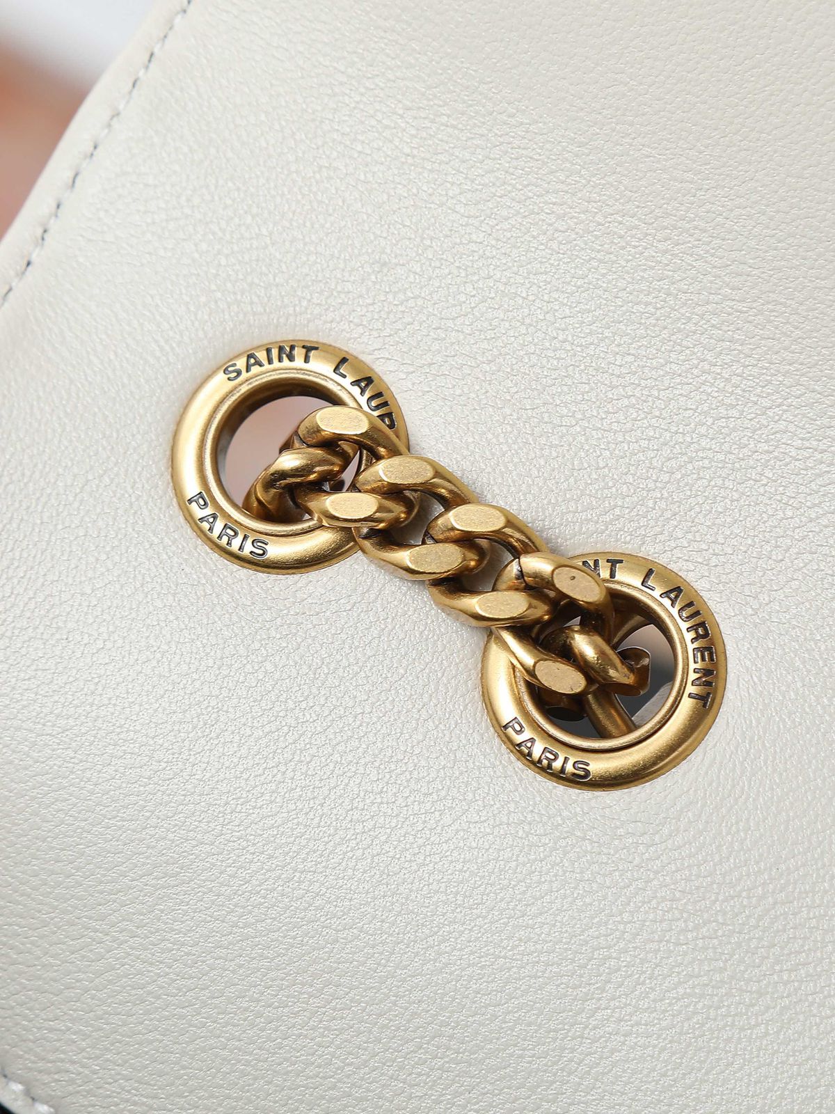 YSL “Luxe Ivory Quilted Chain Bag”